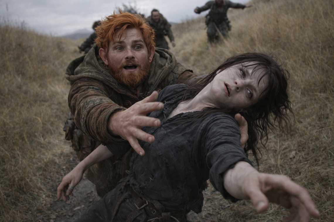 Maris collapses mid-stride, her body hitting the ground before she can break the fall